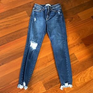 Darkwash distressed stretch frayed bottom jeans 27